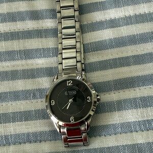 Coach Stainless Steel Women’s Wristwatch with Brown Dial face.